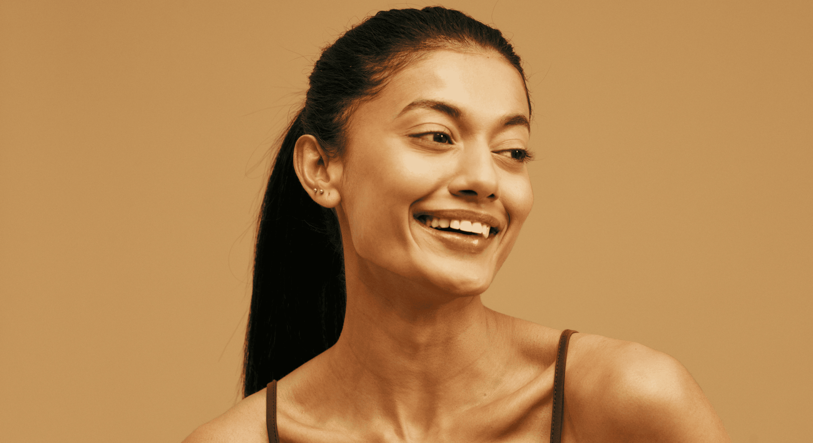 Clear youthful skin woman smiling, skincare and aesthetic treatment, Aetheria Aesthetics & Wellness.